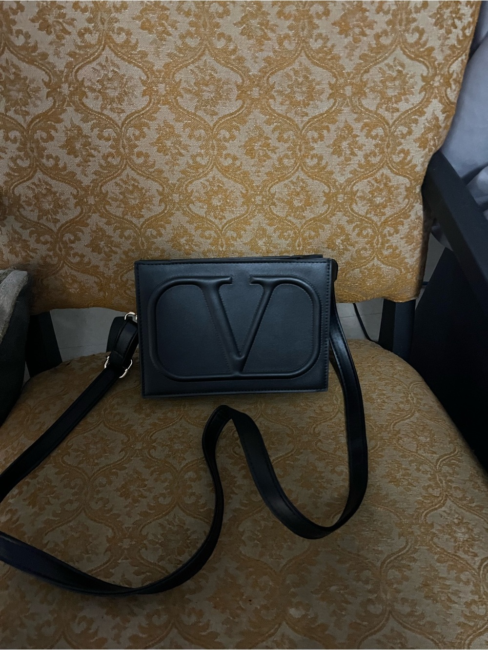 Black Women's Crossbody Bag with Embossed 'V' Detail